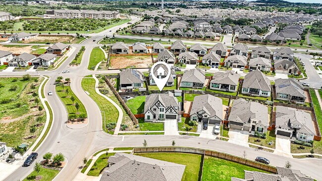 Building Photo - "Spacious 5-Bed Oasis with 4.5 Baths – You...