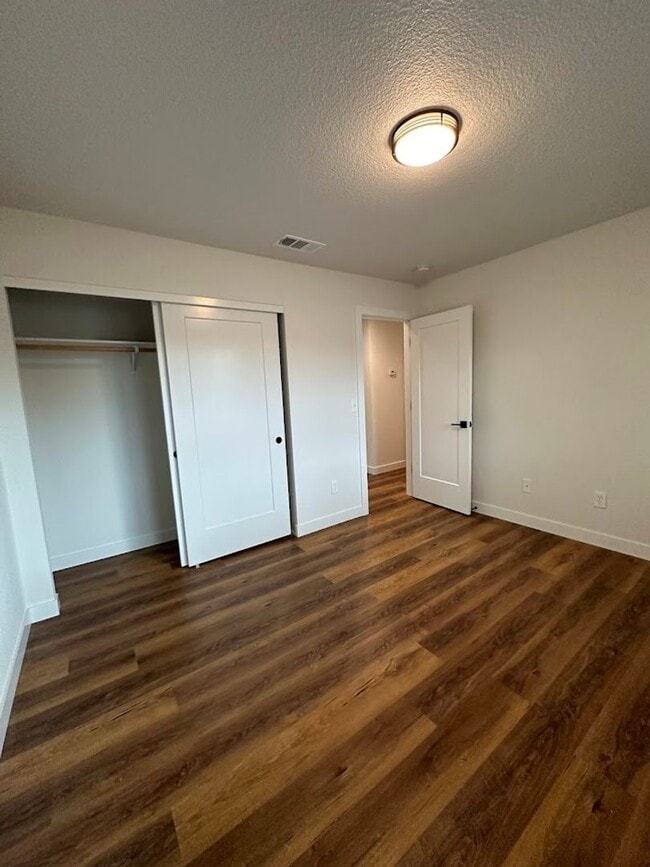 Building Photo - Updated Home with Island Kitchen, LVP Flooring, and Yard Care Included!