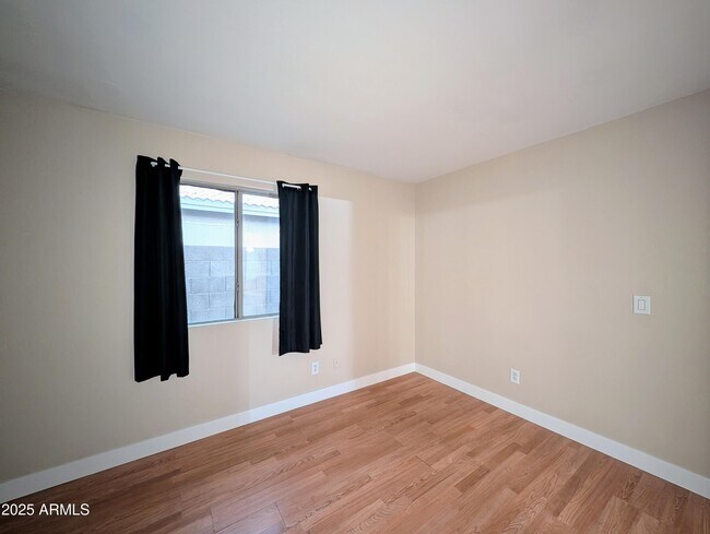 Building Photo - 7059 W Gardenia Ave