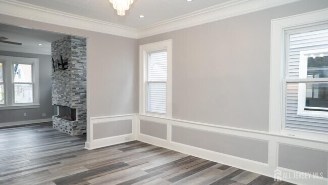 Building Photo - 65-65 Poe Ave