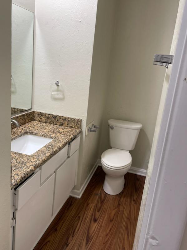 Building Photo - AVAILABLE NOW. GRANITE COUNTERTOPS. Spacious single-level Townhome with upgraded flooring throughout