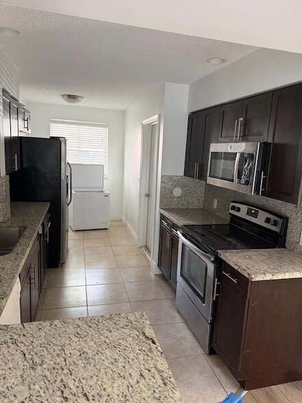 Building Photo - 10939 W Broward Blvd