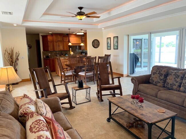 Building Photo - AVAILABLE 2027 SEASON! ! PGI HEATED POOL, WATERFRONT, BOAT LIFT