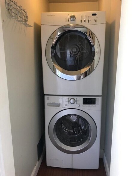 Stackable washer/dryer located in kitchen closet - 23 County St