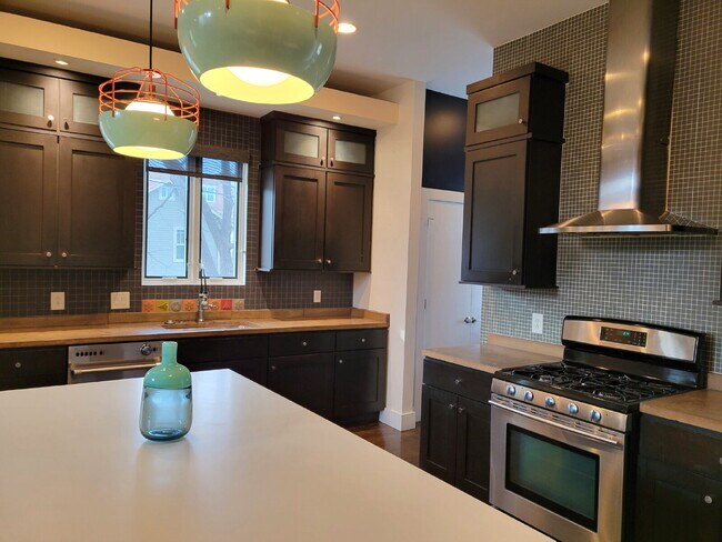 Building Photo - Luxury 12 South Brownstone with Courtyard | Rooftop Deck with Fireplace & Scenic Views | 2-Car Ga...
