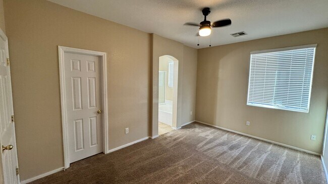 Building Photo - Gated 3 BDRM Master BDRM downstairs