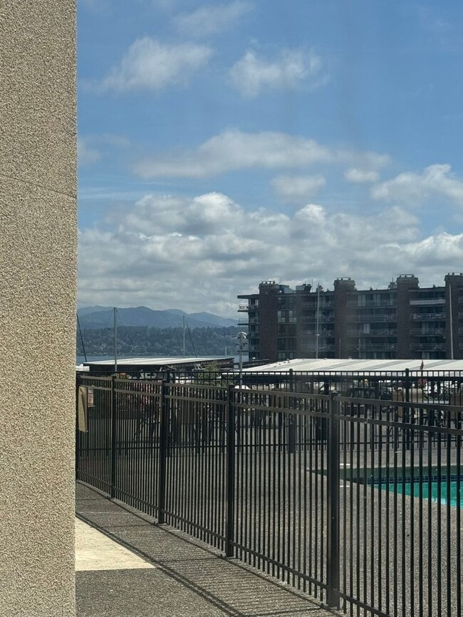 Building Photo - Gorgeous Condo in Seward Park with 2 Parking Spaces, Steps Away from Pool with Water View!