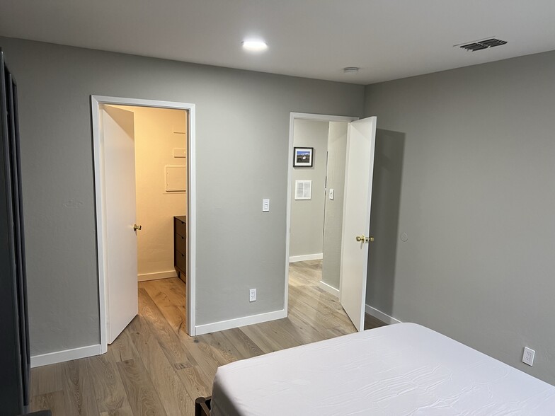Bedroom: View from right side, Hallway - 1177 Honey Trl