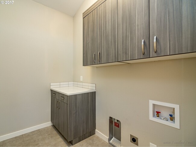 This is a picture of the laundry room before we added the washing macines and dryer. - 5846 SE Insley St