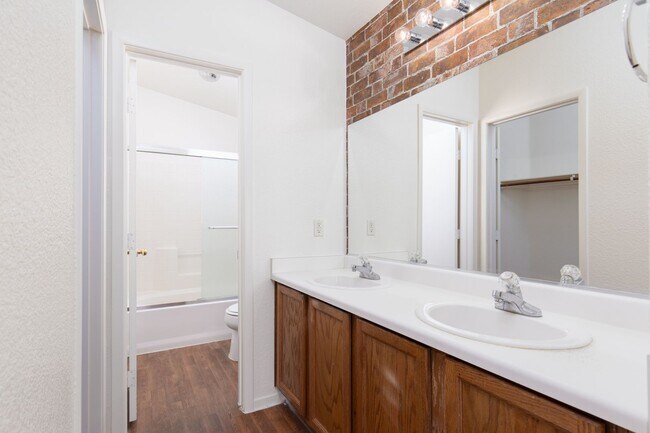 Building Photo - Two bedroom townhome with garage in gated ...