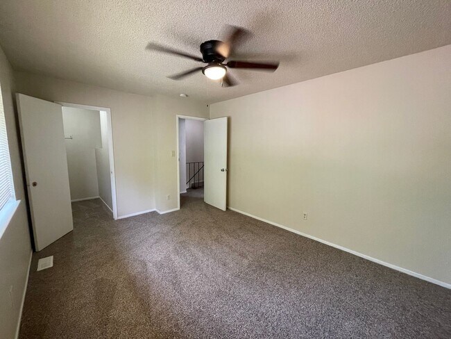 Building Photo - Two Story Fourplex Unit - On site Laundry, Carport, Ceiling Fans