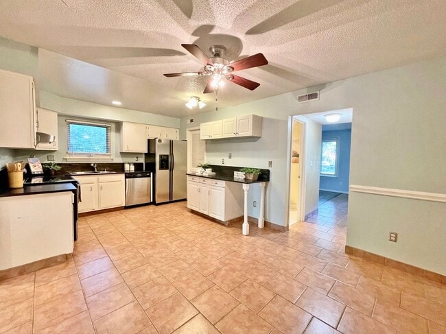 Building Photo - READY 11-07-25!! 3-Bedroom Townhome at the...