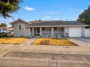 Building Photo - Corner Lot Beauty with Dual Driveways and Upgrades in San Leandro