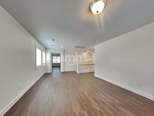 Building Photo - 10749 Artesia Wells St