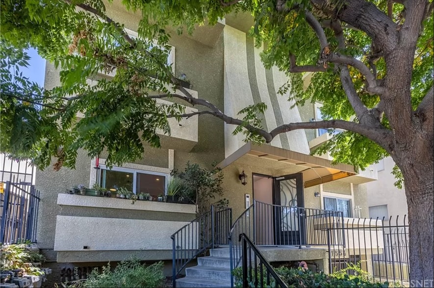 Front of the building. Two left sliding doors are part of this unit.both - 1554 N Hobart Blvd