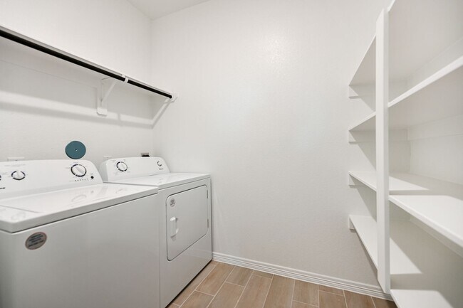 Building Photo - Brand new, contemporary 1-story home. FRID...