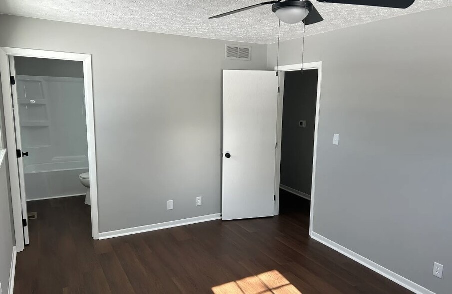 Primary bedroom with new fixture and flooring - 2751 Hart Rd