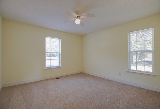 Building Photo - Corner Lot 3 Bedroom Single-Family Rental with Large Deck