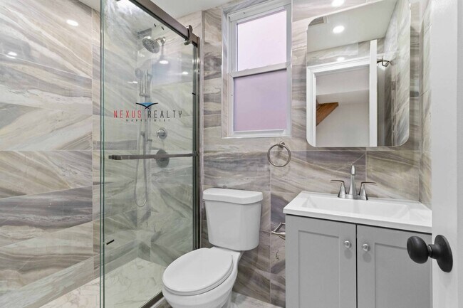 Building Photo - 21-28-28 48th St