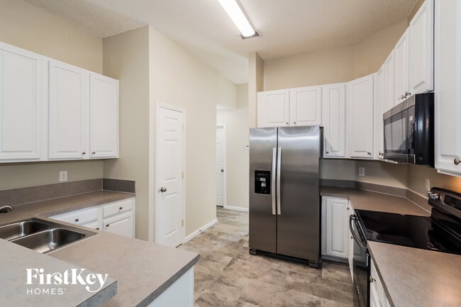 Building Photo - 9241 Hawks Run Ln