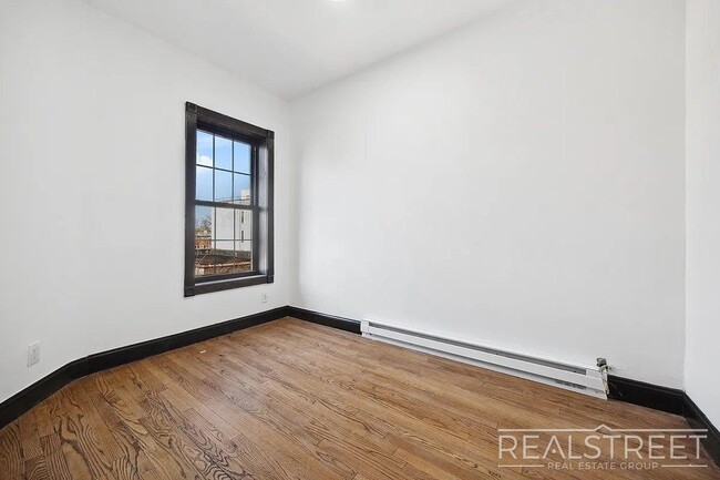 Building Photo - Timelessly Renovated Historic Triplex with...