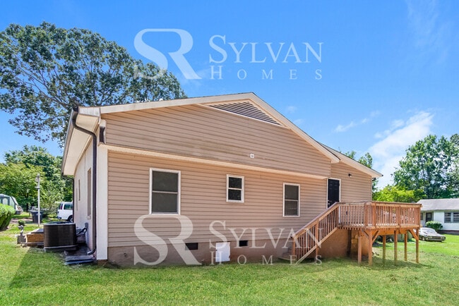 Building Photo - Turn the key. Enter. Smile. Repeat every day!