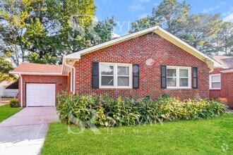 Building Photo - Lease today! No extra charge for contentme...