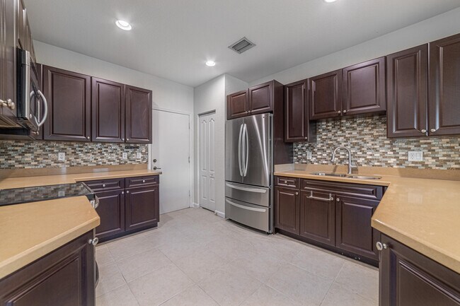 Building Photo - 4109 Macarthur Palm Trail