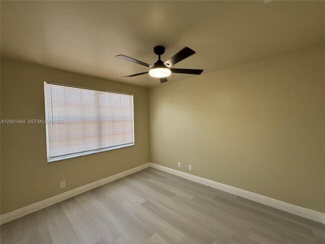 Building Photo - 5450 NW 94th Terrace