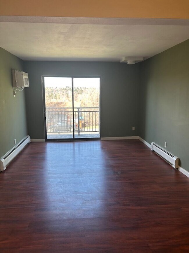 Building Photo - Top-Floor Condo with Trail Access + Community Perks!