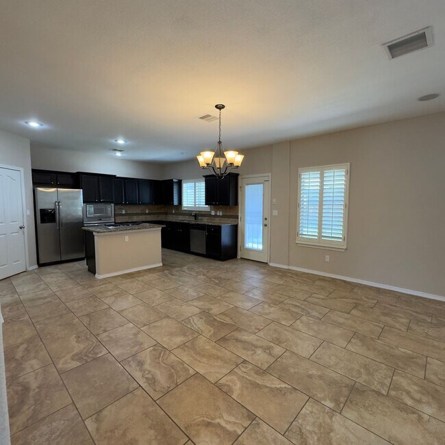 Building Photo - 4 Bedrooms, 3 Baths, a Pool, and Solar Panels!