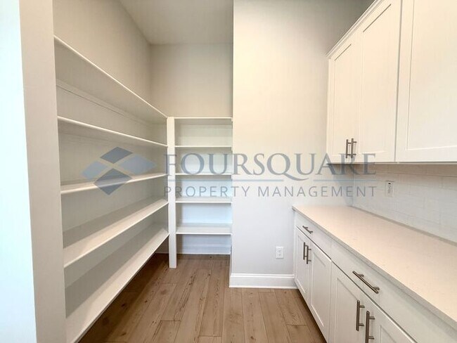 Building Photo - Elegant 4-Bed / 3.5-Bath Home with Main-Level Primary Suite, Quartz Kitchen & 3-Car Garage – In H...