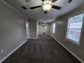 Building Photo - Spacious 4-Bedroom Home with Detached Gara...