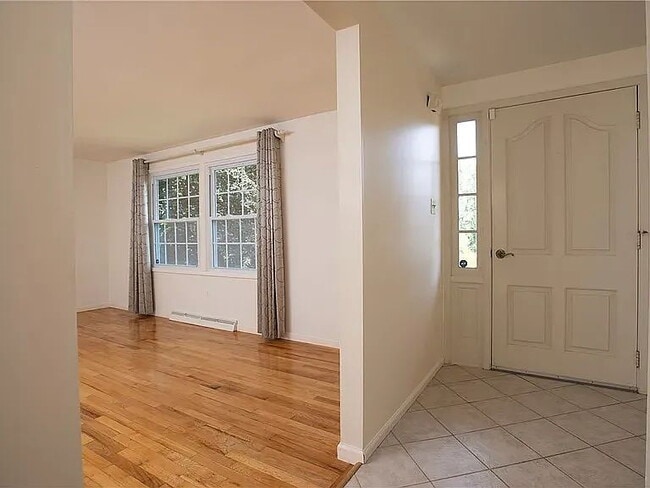 Building Photo - Charming 4-Bed Retreat with Finished Basem...