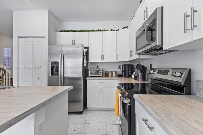 Building Photo - 10945 West 33rd Ct