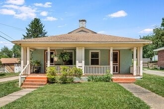 Building Photo - Charming 1930s Shotgun Duplex – Updated Bath, Walk-In Pantry, Water Included