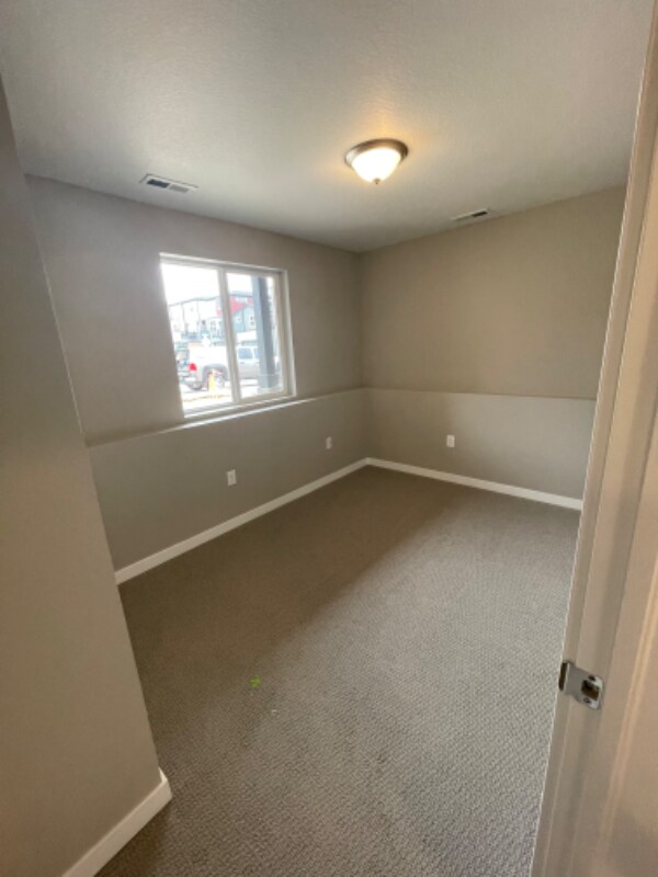 Building Photo - 6381 Rollick Dr