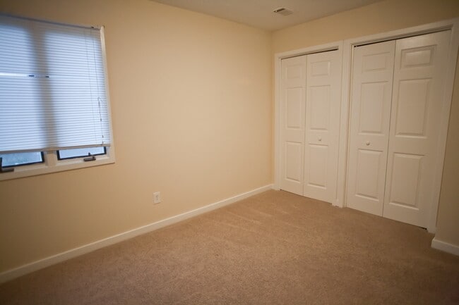 Building Photo - Live close to campus!
