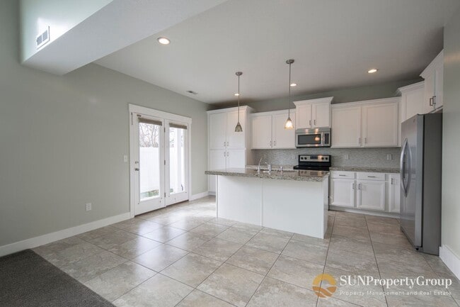 Building Photo - Stunning Townhome In Desirable Riverton Area