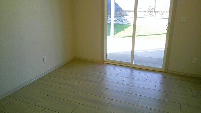 Building Photo - Immaculate Single Level Northeast Home With Refrigerated Air Located In Quiet Neighborhood