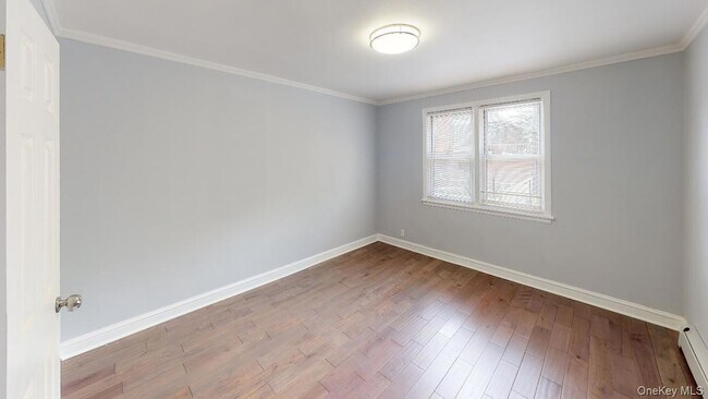 Building Photo - 67-12 Juno St