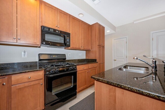 Building Photo - Desirable Two Level Condo For Lease - Not Pet Friendly