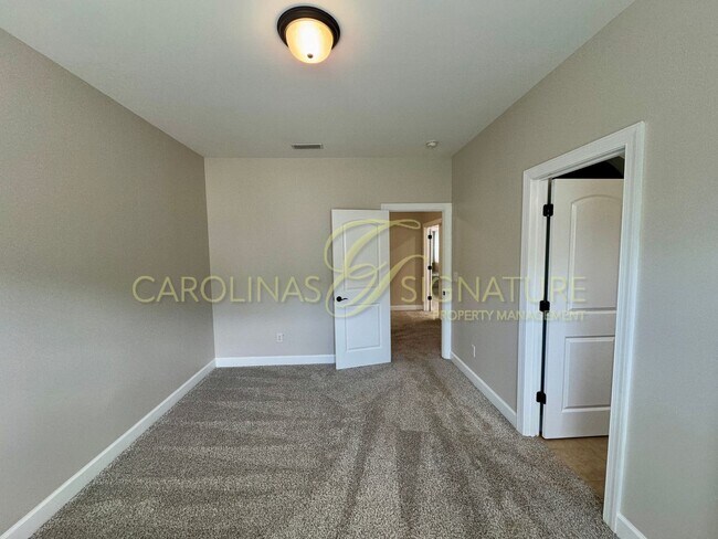 Building Photo - Spacious 5BR/5BA Home in Indian Lands Wake...