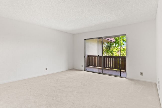 Building Photo - Modern 2-Bedroom Condo with Pool and Koi Pond Views