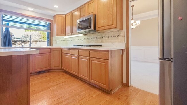 Building Photo - Spacious Updated 4 Bedroom Home with 3 Car Garage