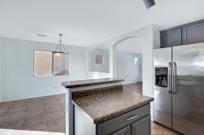 Building Photo - 9547 E Belmont Ave