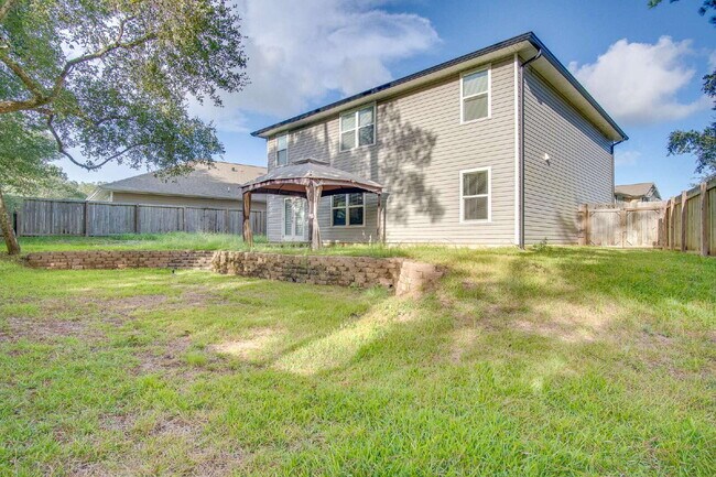 Building Photo - Season’s Savings! Spacious 5BR Near NAS – Military Half Deposit & $500 Off First Month!