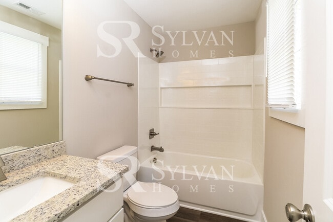 Building Photo - This lovely 3BR, 2.5BA home is move-in ready