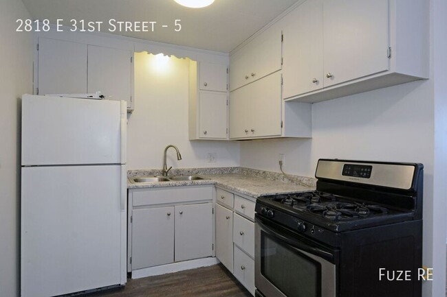 Building Photo - **Move In Special!** Spacious 2-Bedroom Up...