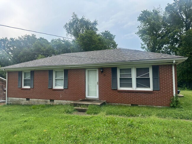 Building Photo - 4 Bedroom and 2 Bath home with large yard